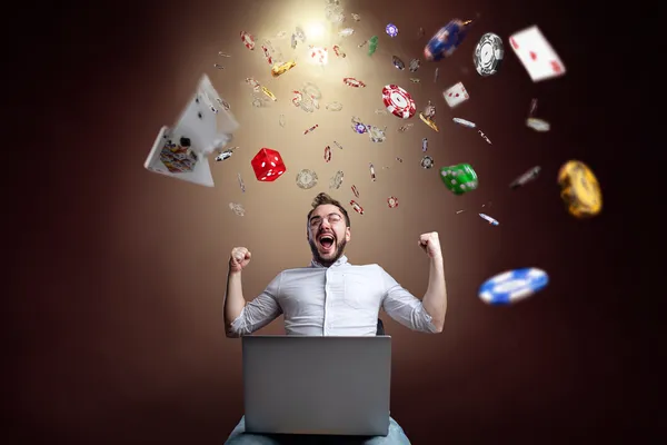 3666BEF Games — Explore our rich library of casino classics A woman smiling while playing online games on her laptop, surrounded by neon casino elements, showcasing 3666BEF’s diverse game collection.